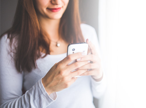 woman searching on smart phone