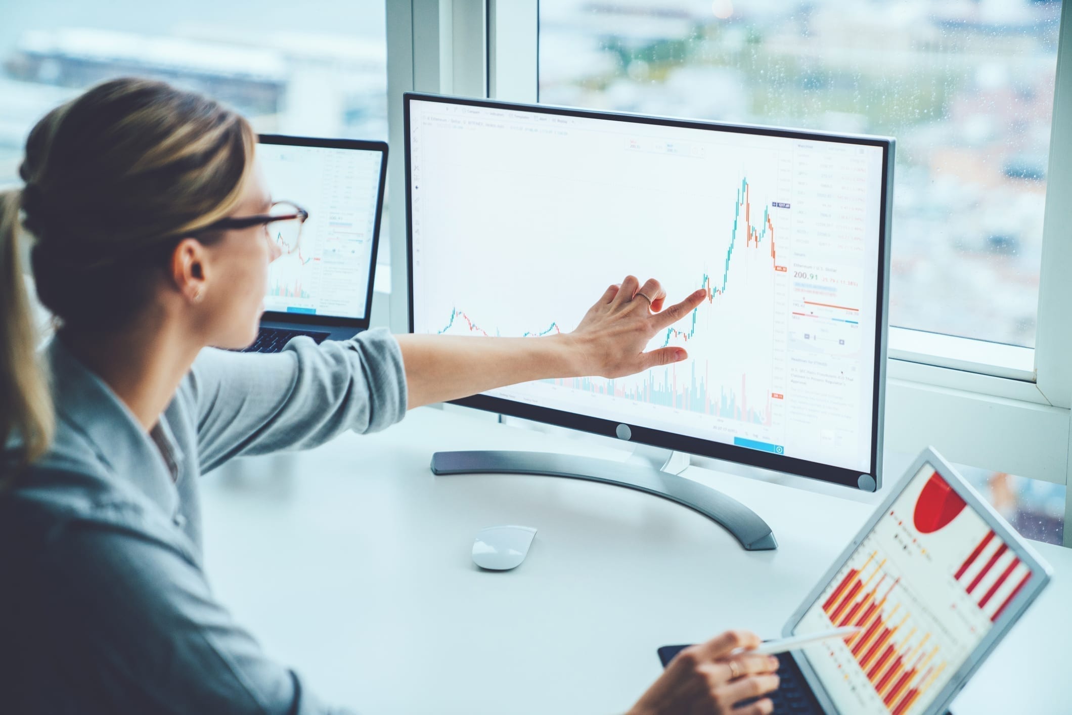 Woman looking at hotel analytics