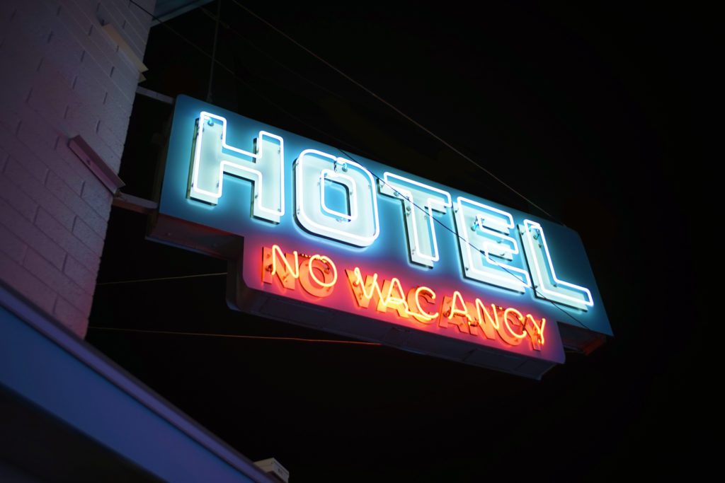 Hotel sign showing no vacancies.